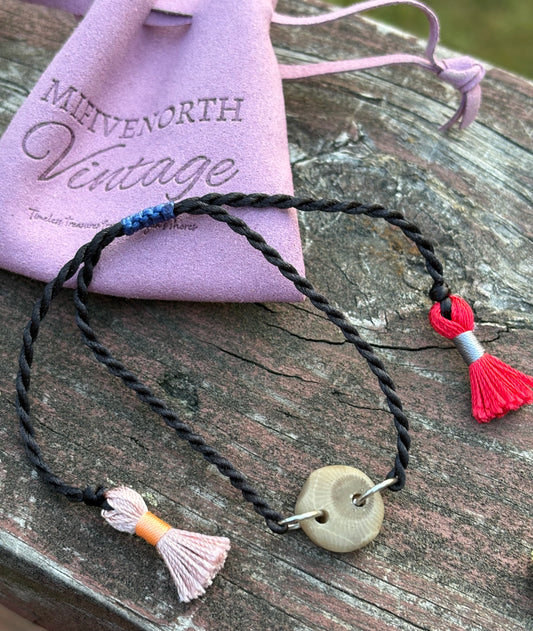 Petoskey Stone Adjustable Tassel Bracelet – Black with Pink + Red Tassels