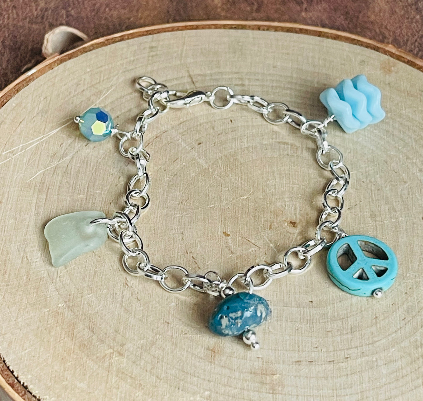Baby blue charm bracelet with authentic Lake Michigan beach glass, Swarovski crystal, and Leland blue charms