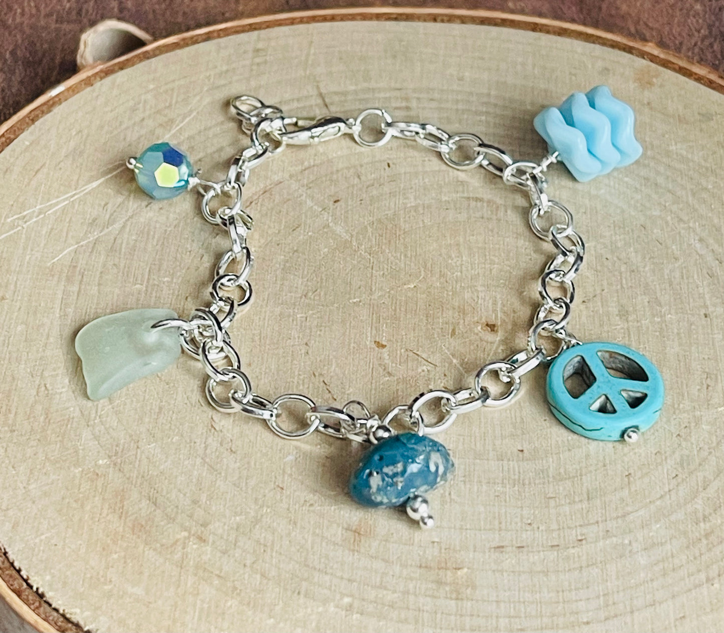 Baby blue charm bracelet with authentic Lake Michigan beach glass, Swarovski crystal, and Leland blue charms