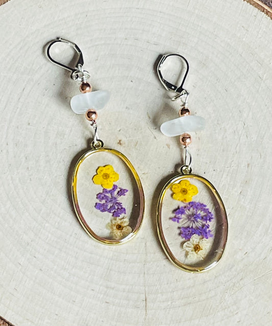 Purple and yellow pressed flower oval earrings with white Lake Michigan beach glass