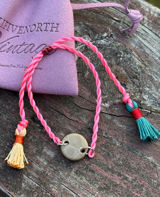 Bright pink Petoskey Stone Adjustable Tassel Bracelet